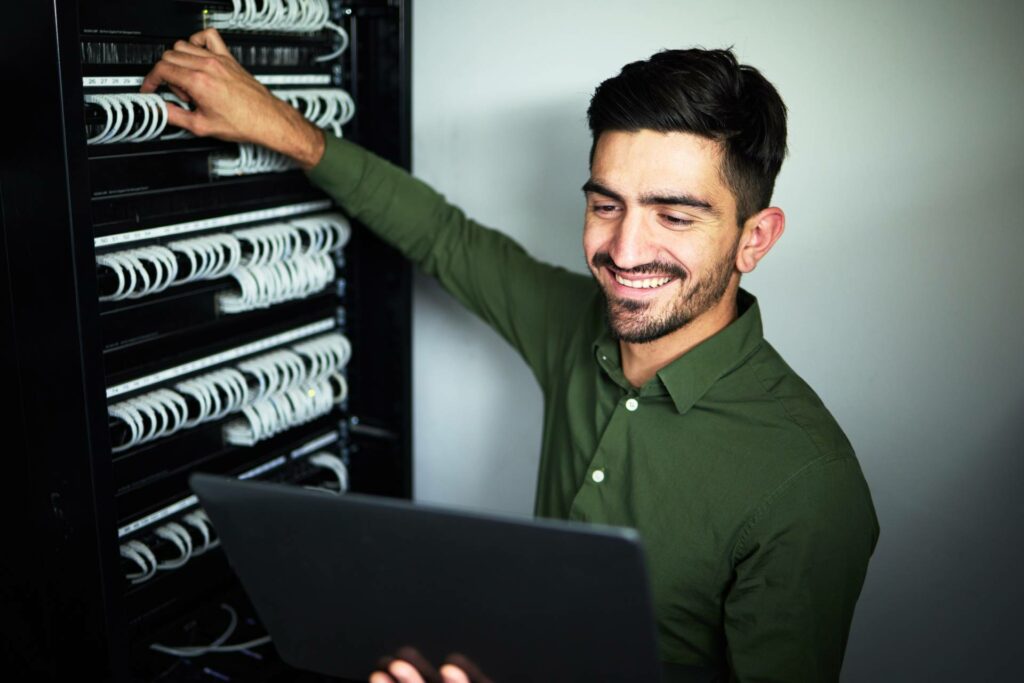 IT provider working in a server room