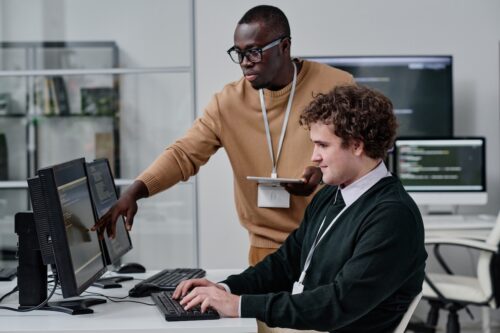 employees working on computer using tools from managed it provider